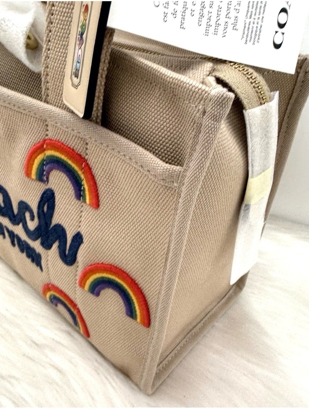 Coach Beige Canvas Tote with Rainbow Embroidered Accents and Striped Strap - Picture 3 of 8